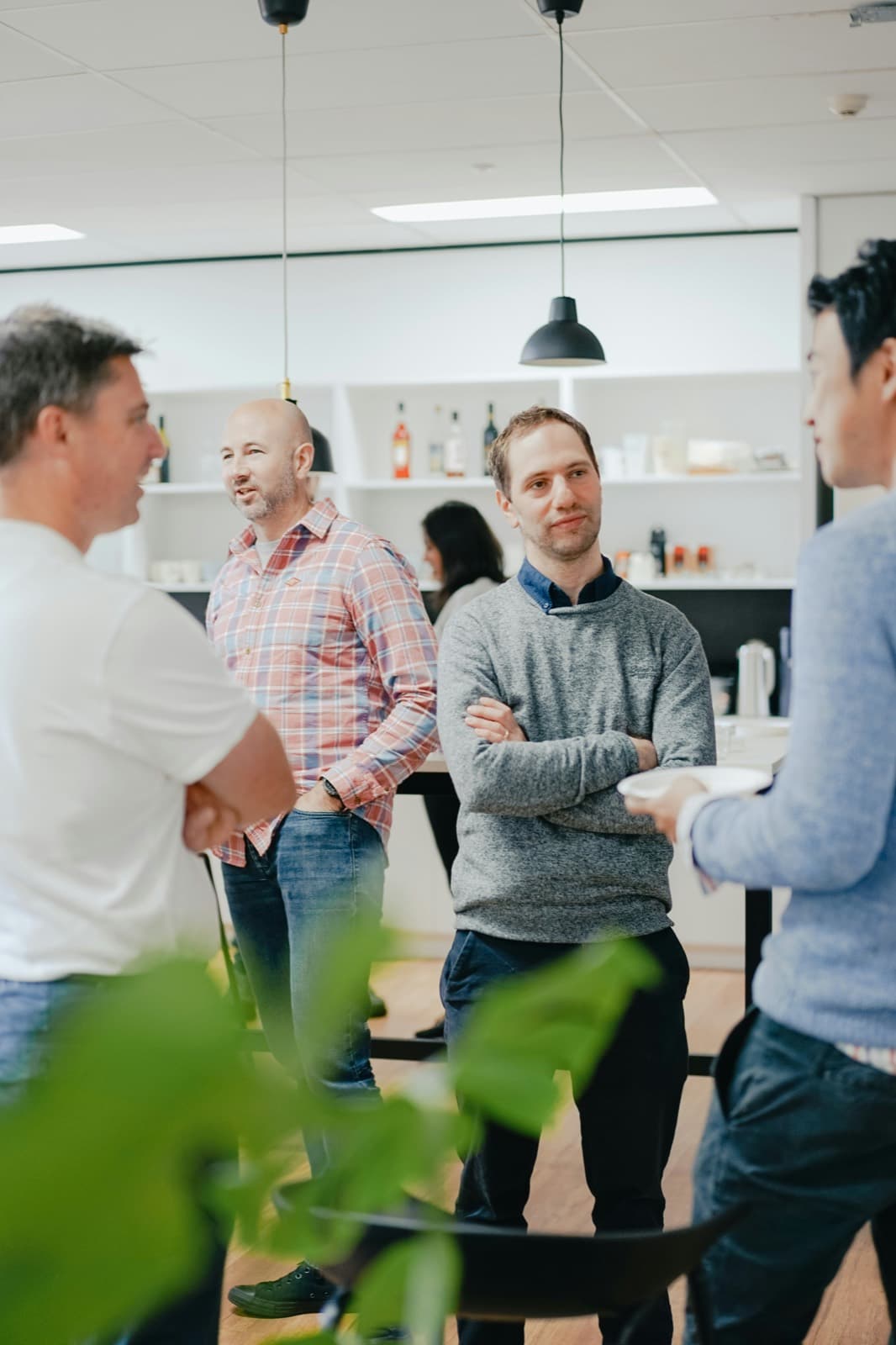 People talking together over coffee